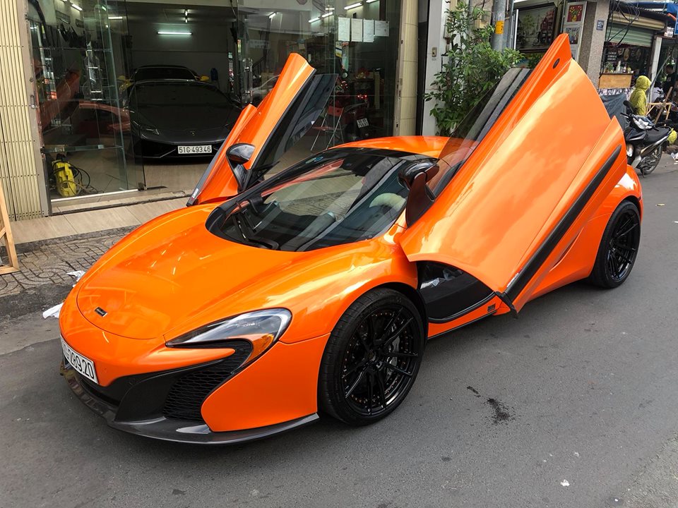 McLaren 650S Spider màu cam độ mâm của hãng ADV.1 đang được rao bán hơn nửa triệu USD.