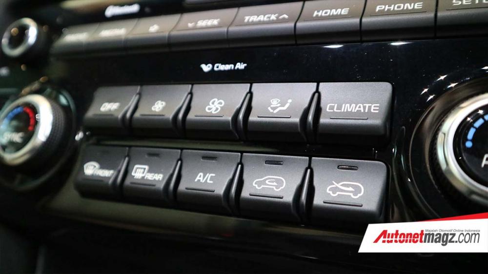 Các nút bấm trên cụm điều khiển trung tâm của Kia Sportage 2019 Các nút bấm trên cụm điều khiển trung tâm của Kia Sportage 2019