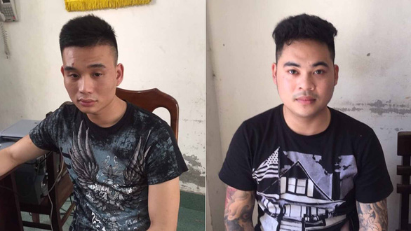 Lê Văn Tùng (trái) và Vi Quang Vinh