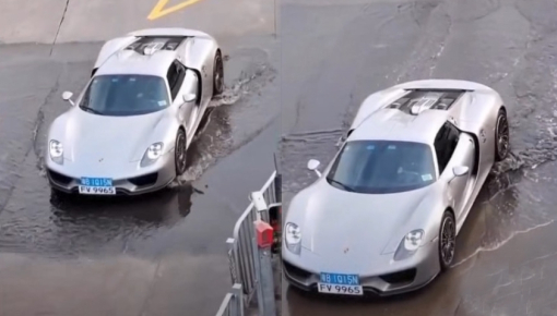 Đại gia rón rén cho Porsche 918 Spyder "bò qua" vũng nước đọng