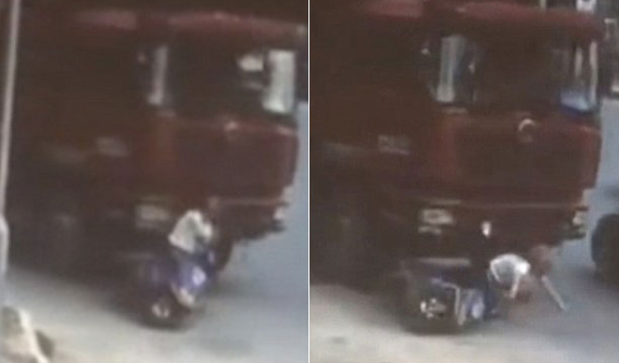 Bị ô tô tải cuốn vào gầm, người phụ nữ đi xe máy thoát chết nhờ mũ bảo hiểm