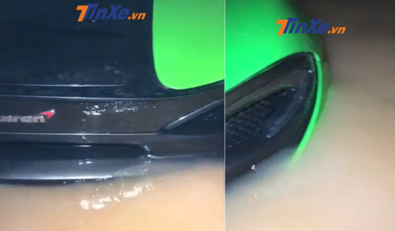 Xót xa với video siêu xe McLaren 570S màu xanh cốm bị nước lũ nhấn chìm trong một hầm đỗ xe