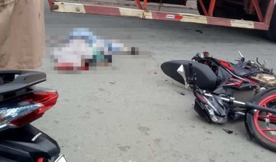 Sài Gòn: Xe container ôm cua, va chạm xe côn tay Suzuki Satria F150, một phụ nữ tử vong