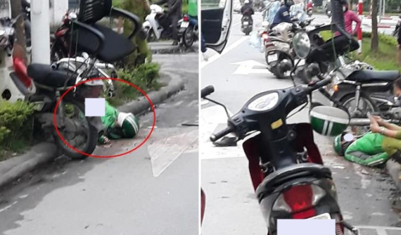 Hà Nội: Tránh xe khác, tài xế GrabBike chạy ngược chiều tông xe máy vào trụ điện, một người nguy kịch