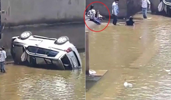 Tập lái xe cùng với chồng, người phụ nữ lao chiếc SUV Toyota Highlander mới mua xuống sông