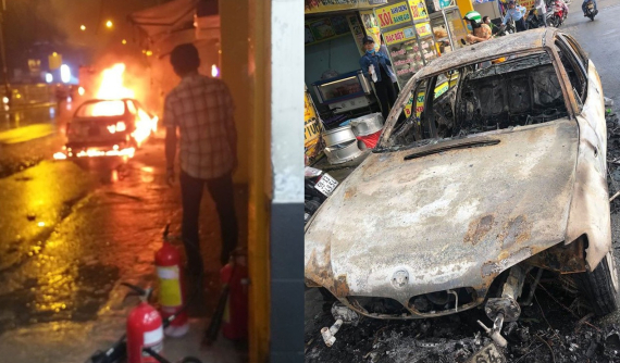 Xe sang BMW bất ngờ bốc cháy trên quốc lộ 13, tài xế mở cửa chạy thoát thân