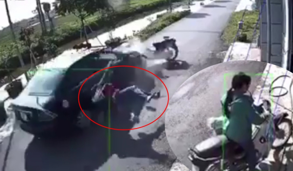 Video: Ô tô tông trực diện người phụ nữ chạy xe máy bằng 1 tay ở Nam Định khiến dân mạng tranh cãi