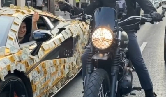 Video: Dán chi chít tiền USD lên ngoại thất McLaren 570S, chủ xe bị gọi là "trọc phú"