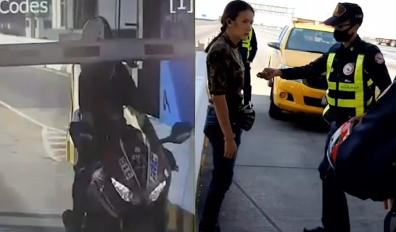 Video: Nữ biker chạy mô tô vào đường cao tốc, tông gãy hàng rào thu phí, chống đối lực lượng chức năng