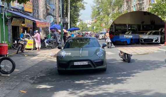 Hay tin siêu xe Audi R8 mình thích có sẵn hàng lướt trên thị trường, Chủ tịch Trung Nguyên liền lái Porsche 911 Turbo S sang coi