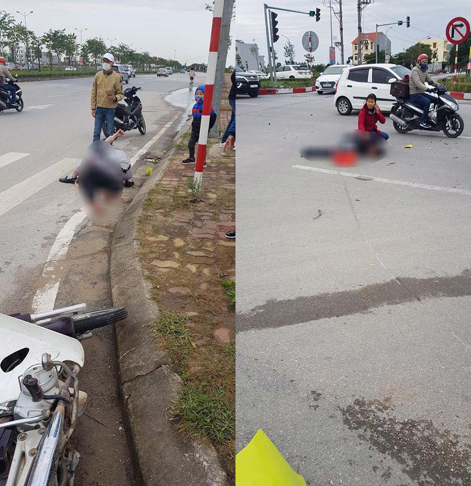 Hai người đi xe máy nằm bất tỉnh trên mặt đường Hai người đi xe máy nằm bất tỉnh trên mặt đường