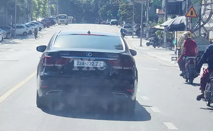 Close-up of license plate 22A-222.22 on Lexus LS460L