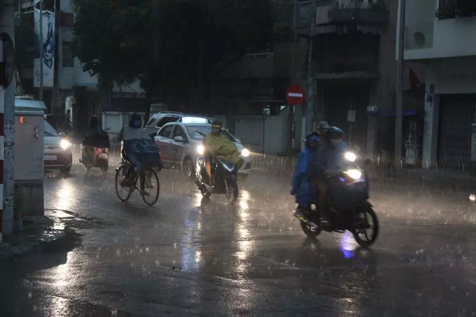 Image of a motorcycle with its headlight on