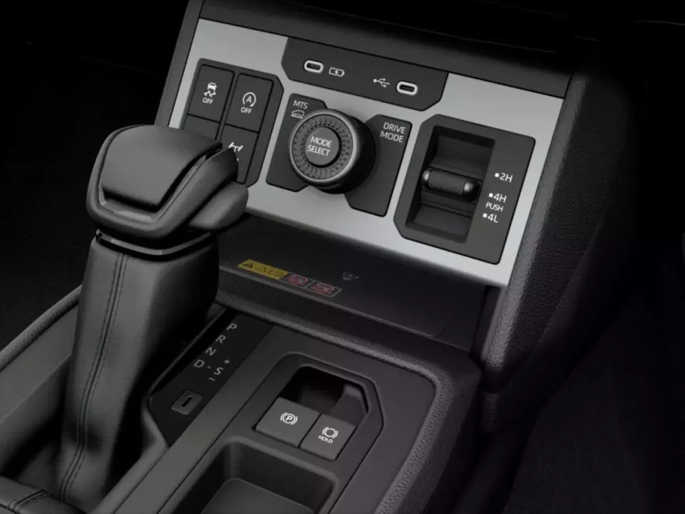 Cụm nút bấm và núm xoay bên dưới màn hình của Toyota Hilux 2026 Cụm nút bấm và núm xoay bên dưới màn hình của Toyota Hilux 2026